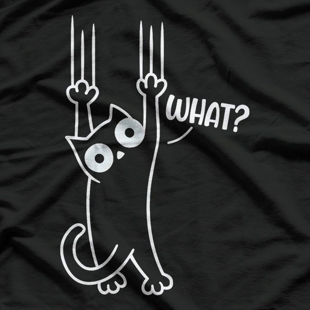 Black and White Cat Hanging On T-Shirt