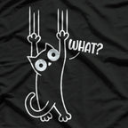 Black and White Cat Hanging On T-Shirt