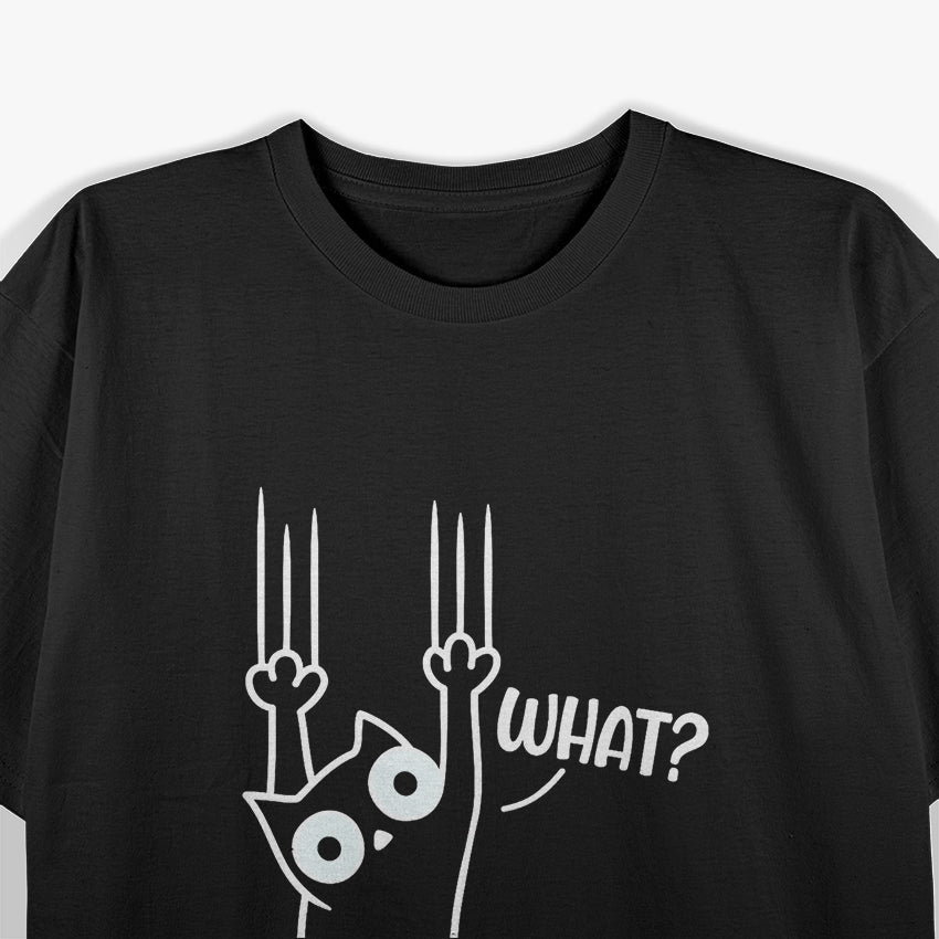 Black and White Cat Hanging On T-Shirt