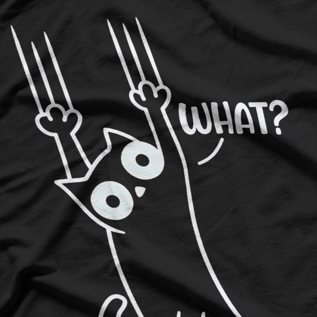Black and White Cat Hanging On T-Shirt